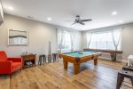 Downstairs game room - arcade game, pool table, shuffle board